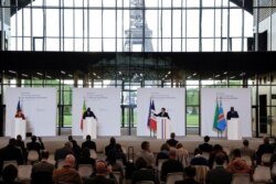 French President Emmanuel Macron holds a news conference with IMF Managing Director Kristalina Georgieva, Senegal's President Macky Sall and President of Congo Democratic Republic Felix Tshisekedi in Paris, May 18, 2021.