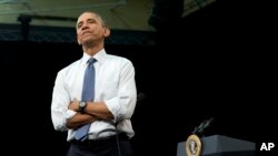 President Barack Obama listens to a question during a town-hall meeting at Benedict College in Columbia, S.C, March 6, 2015.