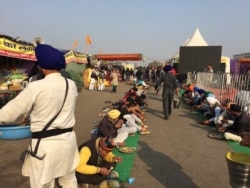 The meals are served to anyone irrespective of faith. (Anjana Pasricha/VOA)