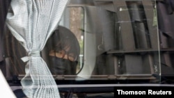 Hong Kong Alliance in Support of Patriotic Democratic Movements of China Vice-Chairwoman Tonyee Chow is seen inside a vehicle after being detained in Hong Kong, Sep. 8, 2021.