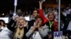 Delegates listen to speakers on the first night of the DNC (Photo: A. Shaker/VOA)