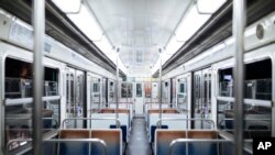The subway is empty of passengers during curfew in Paris, Saturday, Oct. 17, 2020. French restaurants, cinemas and theaters are trying to figure out how to survive a new curfew aimed at stemming the flow of record new coronavirus infections. The…