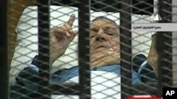 Former Egyptian President Hosni Mubarak during his trial at the police academy in Cairo, August 15, 2011