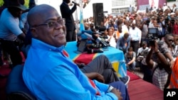 Opposition presidential candidate Felix Tshisekedi waits to address his supporters at the UDPS party headquarters in Kinshasa, Congo, Dec. 21, 2018.