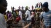 People sell clothes at the displaced camp at Mpoko international airport in Bangui, Central African Republic, Feb. 26, 2014.
