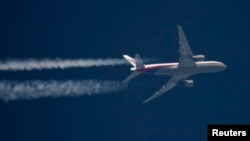 Un Boeing 777 de Malaysia Airlines survole la Pologne d'Amsterdam à Kuala Lumpur, le 12 avril 2012.