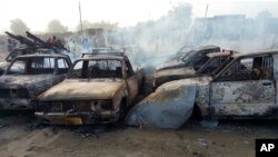 Wasu motoci da 'yan bindiga suka kona.