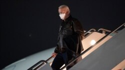 President Joe Biden walks down the steps of Air Force One after arriving at Hagerstown Regional Airport for a trip to Camp David, Friday, Feb. 12, 2021, in Hagerstown, Md. (AP Photo/Evan Vucci)