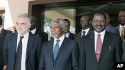 International Criminal Court Chief Prosecutor Luis Moreno Ocampo, left, former U.N. chief Kofi Annan, center, and Kenyan Prime Minister Raila Odinga, right, walk outside Crowne Plaza Hotel in Nairobi, Kenya, Dec 2, 2010