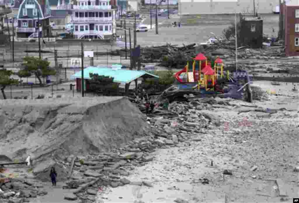Sand and debris cover a part of town near the ocean in Atlantic City, New Jersey, October 30, 2012, a day after Sandy made landfall.