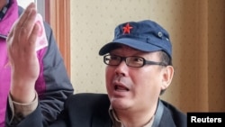 Yang Hengjun, penulis buku dan mantan diplomat CHina, yang kini berkewarganegaraan Australia saat berada di Tibet, China, pertengahan Juli, 2014. (Foto: dok).