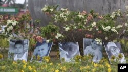 Photos of the dead are displayed in a roundabout In Managua, Nicaragua, April 24, 2018. Human rights groups say clashes between police and protesters left nearly 30 dead since people have protested proposed tax hikes and benefit cuts to shore up the ailing social security system.