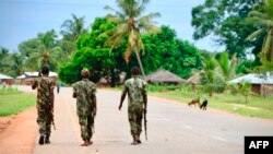 In this file photo taken on March 7, 2018, Soldiers from the Mozambican army patrol the streets after security in the area was increased, following a two-day attack from suspected Islamists in October last year.
