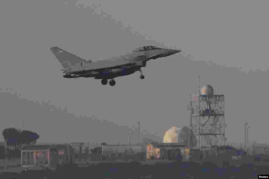 A fighter jet prepares to land at RAF Akrotiri, a military base Britain maintains on Cyprus, April 14, 2018. 
