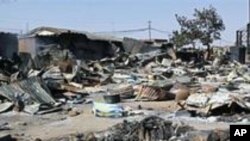 Des maisons détruites lors des violences intercommunautaires de janvier 2010 au Nigeria.