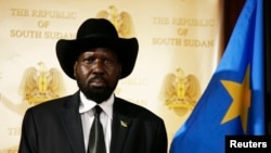 South Sudan's President Salva Kiir, shown here at a news conference in April, says the country's austerity measures could be lifted in January.