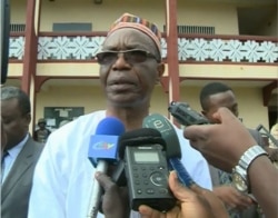 FILE - Governor Deben Tchoffo visited a Presbyterian school where 80 students and their principal were kidnapped in Bafut, near Bamenda, Cameroon, Nov. 5, 2018.