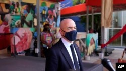 Secretary of Homeland Security Alejandro Mayorkas speaks with the media outside of the Little Haiti Cultural Center, May 25, 2021, in Miami. 
