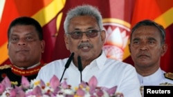 FILE - Sri Lanka's President Gotabaya Rajapaksa addresses the nation, at the presidential swearing-in ceremony in Anuradhapura, Sri Lanka, Nov. 18, 2019. 