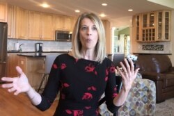 FILE - Economics and Public Policy professor Stephanie Kelton, the State University of New York at Stony Brook, speaks during an interview with Reuters in Setauket, Long Island, New York, June 11, 2019.