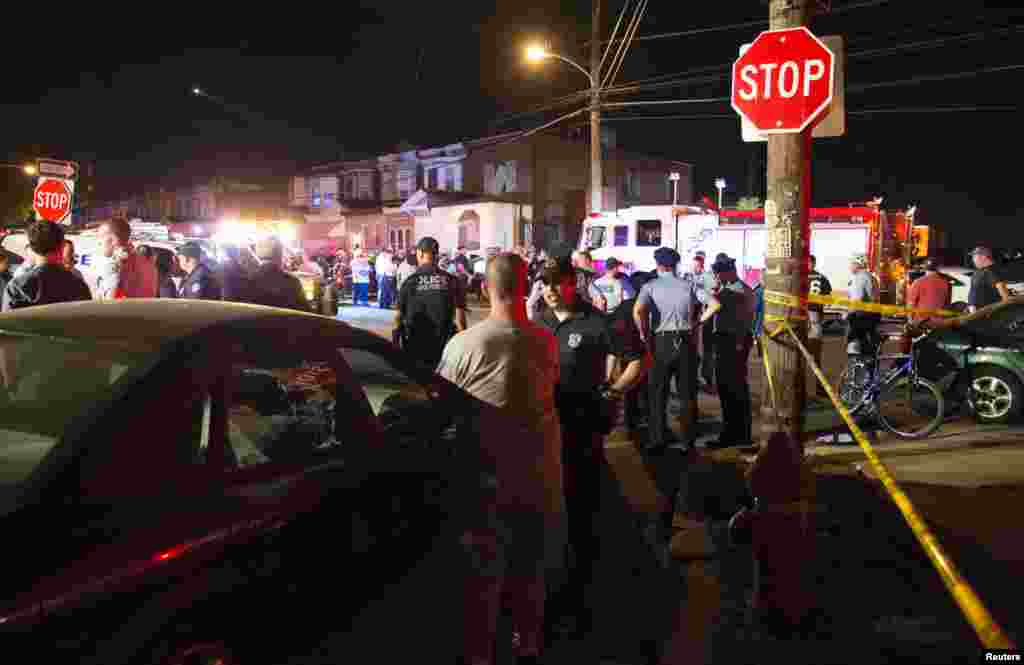 Emergency personnel at work after the Amtrak train derailment in Philadelphia, May 12, 2015.