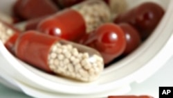 FILE - A new study suggests that doctors who receive free meals from pharmaceutical companies are more likely to prescribe name brand drugs over cheaper generics.