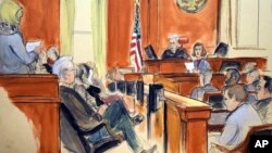 In this courtroom sketch, the jury foreperson reads the verdict as defendant Mehmet Atilla, foreground far right, listens at the United States Courthouse in New York, Jan. 3, 2018. Atilla was convicted on charges that he took part in a complex scheme in which Iran traded its oil and gas for gold. 