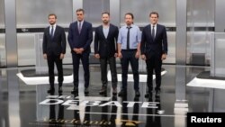 The main candidates for the Spanish general elections pose before a televised debate in Madrid, Spain, Nov. 4, 2019. 