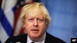 FILE - Boris Johnson speaks at United Nations Headquarters during a meeting of the UN Security Council, March 23, 2017. 7 