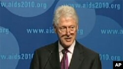 President Clinton speaking at the 18th International AIDS Conference in Vienna.