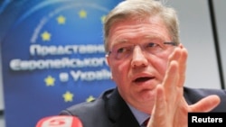 FILE - EU enlargement commissioner Stefan Fule speaks during a news conference in Kyiv, Ukraine, Feb. 13, 2014. 