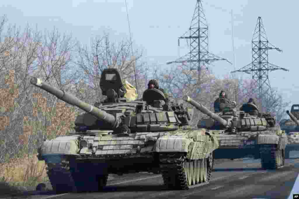 Pro-Russian rebel military vehicles move towards Donetsk, eastern Ukraine, Nov. 10, 2014. 