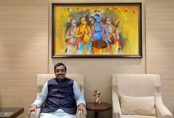 FILE - Ram Madhav, a senior leader in India's ruling Bharatiya Janata Party (BJP), poses after his interview with Reuters in New Delhi, India, July 10, 2019.