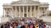 A group of Democrat Capitol Hill interns pose on the east steps of the U.S. Capitol in Washington, July 19, 2016.