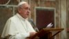 FILE - Pope Francis meets ambassadors to the Holy See, at the Vatican, Jan. 13, 2014.
