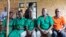 FILE - Four journalists of Burundi's independent media Iwacu Press Group and their driver appear at the High Court in Bubanza, western Burundi, Dec. 30, 2019, accused of complicity in endangering the internal security of the state. 
