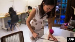 People just starting out in the fashion industry may have to do many things, or wear many hats. 