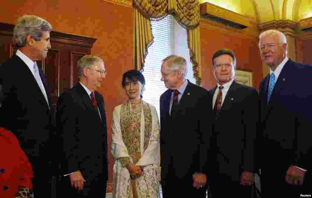 Aung San Suu Kyi meets with Senators (L-R) John Kerry (D-MA), Mitch McConnell (R-KY), Harry Reid (D-NV), Jim Webb (D-VA), and Saxby Chambliss (R-GA) at the U.S. Capitol in Washington, D.C., September 19, 2012. 