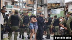 A social media image purports to show police activity following a bar shooting in Belem, Brazil. (Twitter/ferozwala)