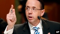 FILE - Deputy Attorney General Rod Rosenstein testifies on Capitol Hill in Washington, June 13, 2017.