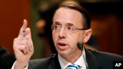 FILE - Deputy Attorney General Rod Rosenstein testifies on Capitol Hill in Washington, June 13, 2017.