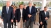 Prime minister Nawaz Sharif, second from left, walks along with then-U.S. Senators John Kerry, Joseph Biden, Chuck Hegel and his party president Shahbaz Sharif, Lahore, Feb 18, 2008 file photo.
