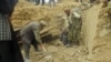 Afghans search for survivors after landslide buried in Abi-Barik village in Badakhshan province, northeastern Afghanistan, May 3, 2014.