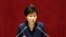 FILE - South Korean President Park Geun-hye delivers a speech at the National Assembly in Seoul, South Korea, following North Korea's recent nuclear test and long-range rocket launch. 