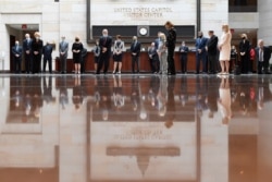 Democratic Senators pause for 8 minutes and 46 seconds on Capitol Hill in Washington, June 4, 2020, to commemorate the life of George Floyd, who died after being restrained by Minneapolis police officers.