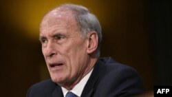 FILE - Dan Coats testifies before the Senate Select Intelligence Committee on his nomination to be the next director of national intelligence in the Dirksen Senate Office Building, Feb. 28, 2017 on Capitol Hill in Washington, D.C.