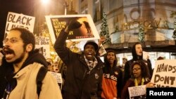 Manifestaçõs em Ferguson. Nov 24. 2014