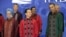 President Barack Obama stands with China's Premier Wen Jiabao, center, as they wait to take a family photo at the East Asia Summit Gala dinner in Nusa Dua, on the island of Bali, Indonesia, November 18, 2011.