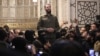 The leader of Syria's Islamist Hayat Tahrir al-Sham (HTS) group that headed a lightning rebel offensive snatching Damascus from government control, Abu Mohammed al-Jolani, addresses a crowd at the capital's landmark Umayyad Mosque on Dec. 8, 2024. 