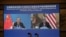 U.S. climate envoy John Kerry, right, meets with China's Foreign Minister Wang Yi via a video link during Kerry's visit in Tianjin, Sept. 1, 2021. (Photo by Handout / US Department of State / AFP) 